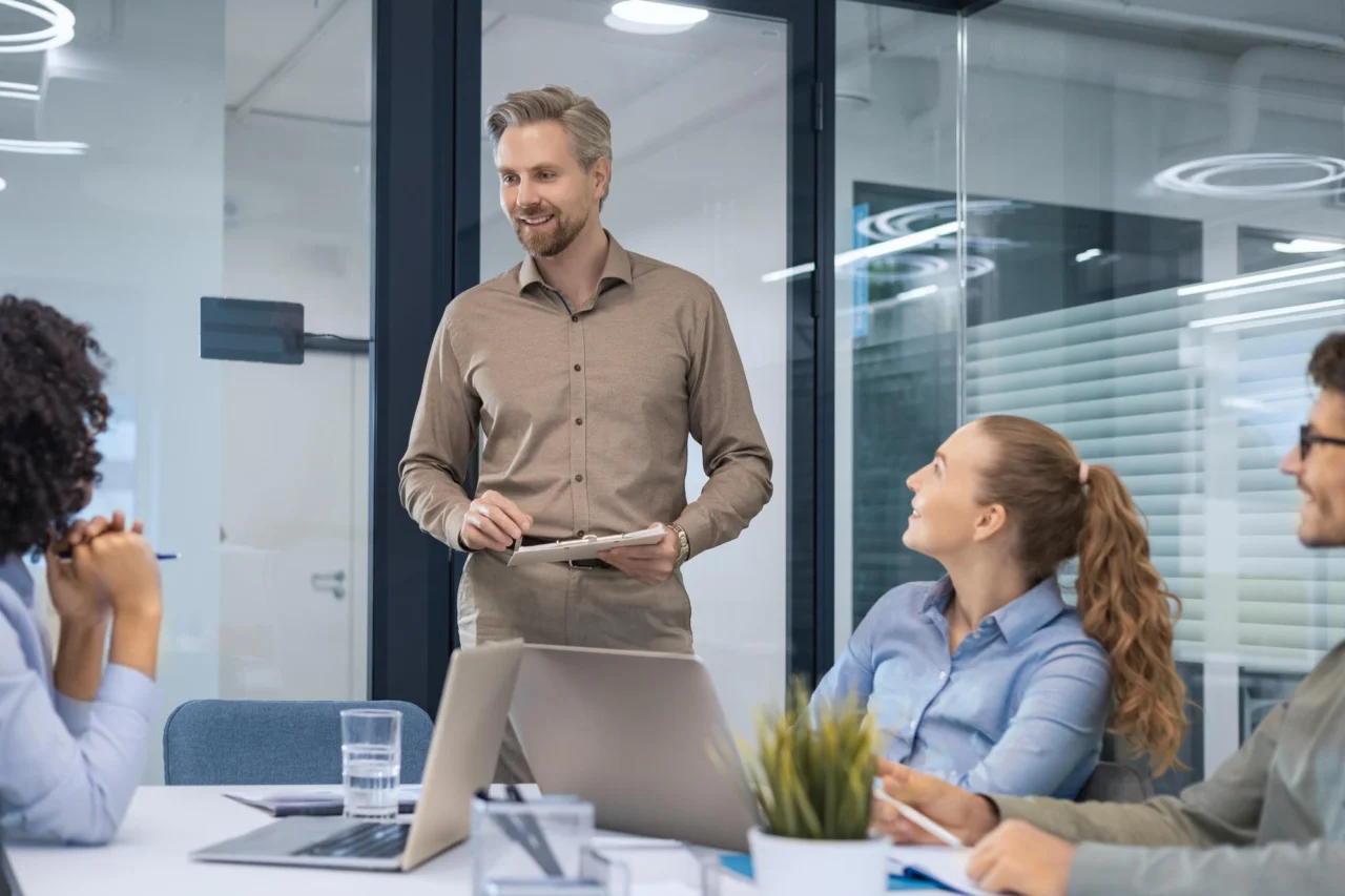 An operator leading a working session with a small team