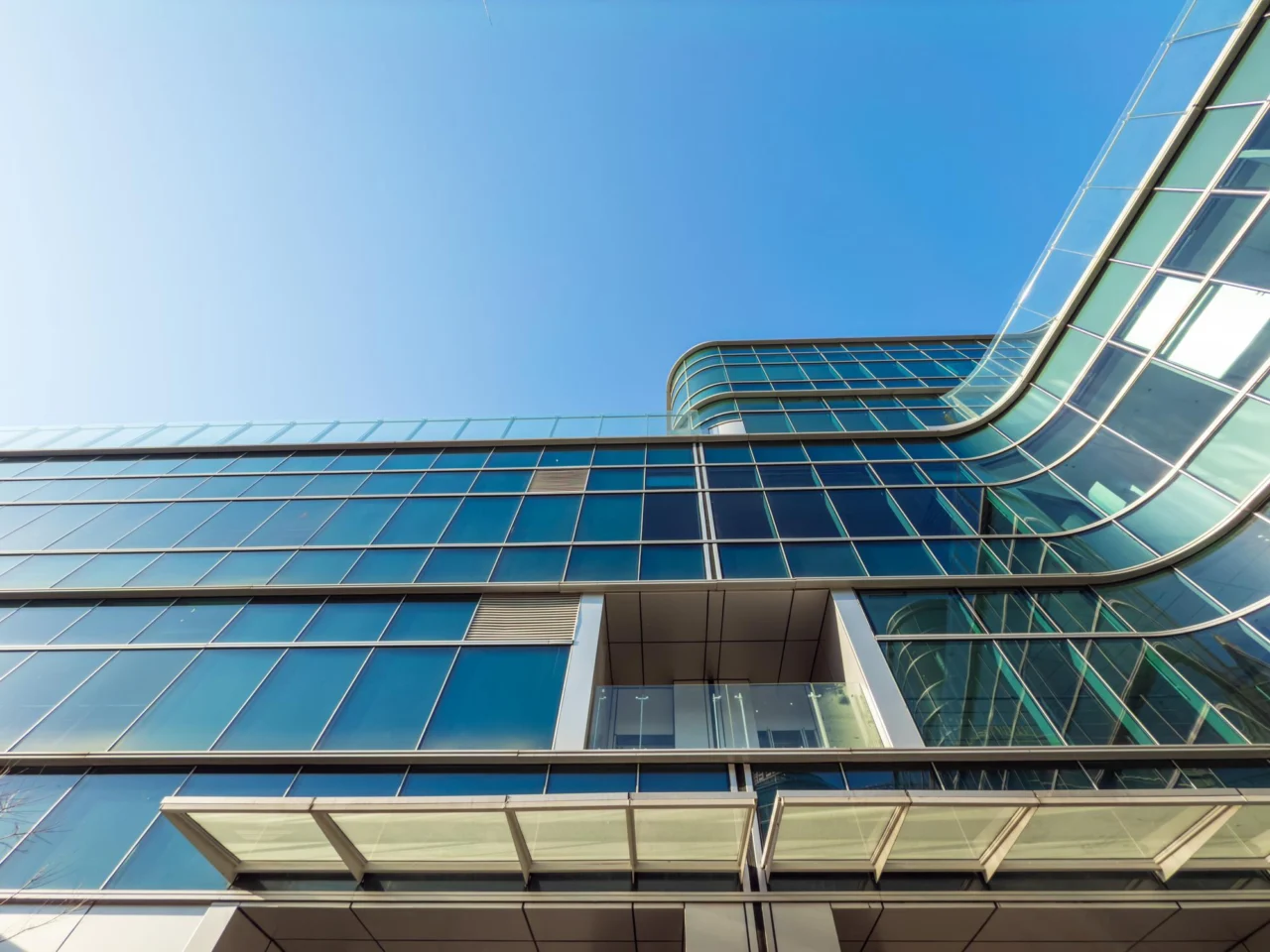 A building under re-architecture — the structure of a company changing as it scales through stages