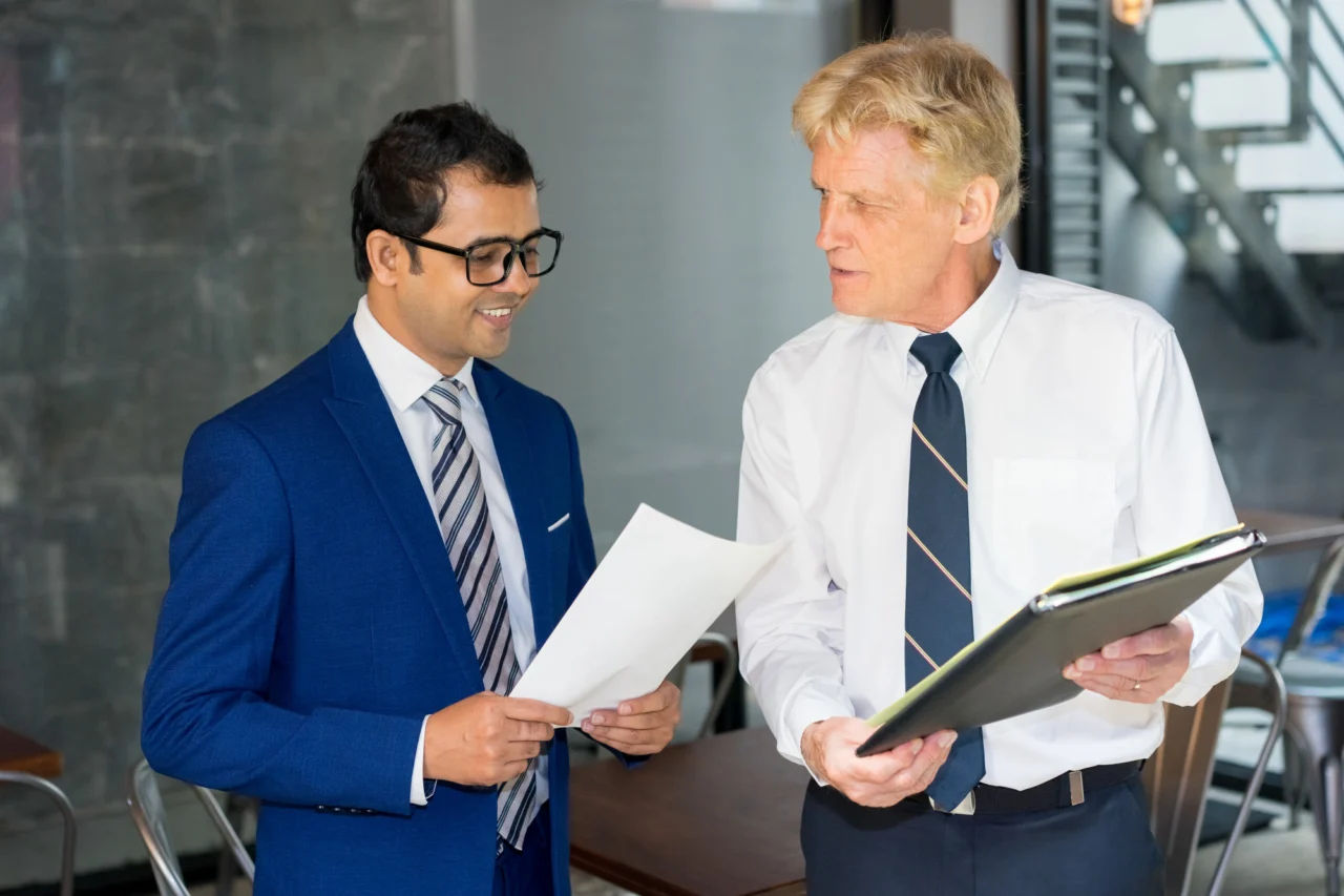 A founder and an operating partner reviewing the numbers together