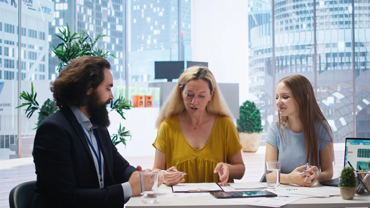 A founder and an adviser reviewing a funding structure