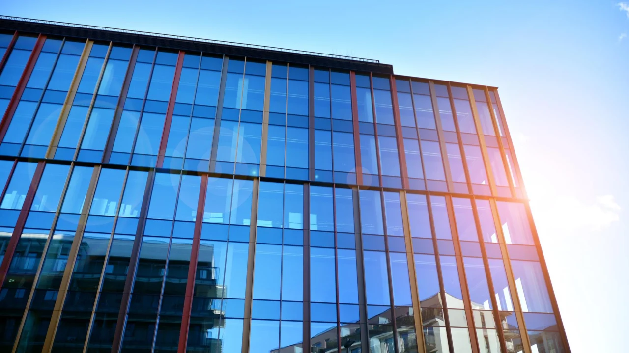 A modern glass office building in a British offshore-finance centre