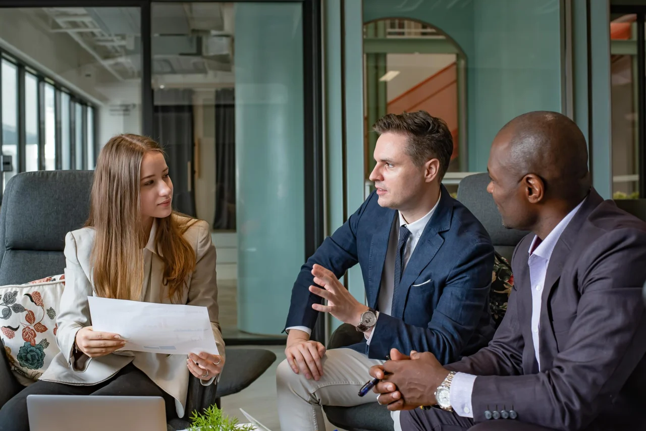 Diverse business colleagues working together in a meeting at a modern office